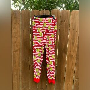 Grinch pajamas size unisex S (28-30).